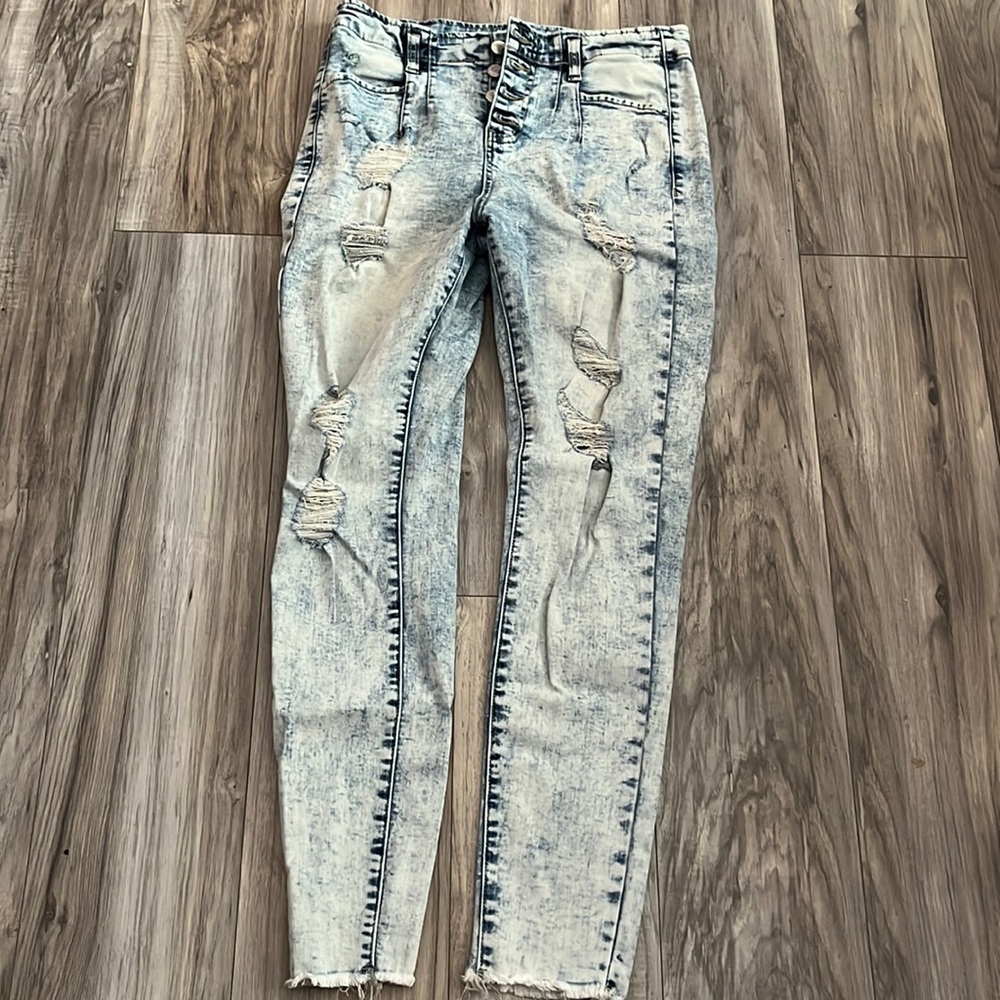 skinny light washed blue jeans,4 buttons,size 7/8 in jeans